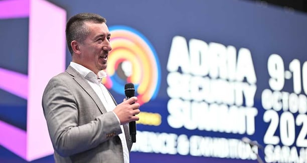 Business conference panel with microphone and notes