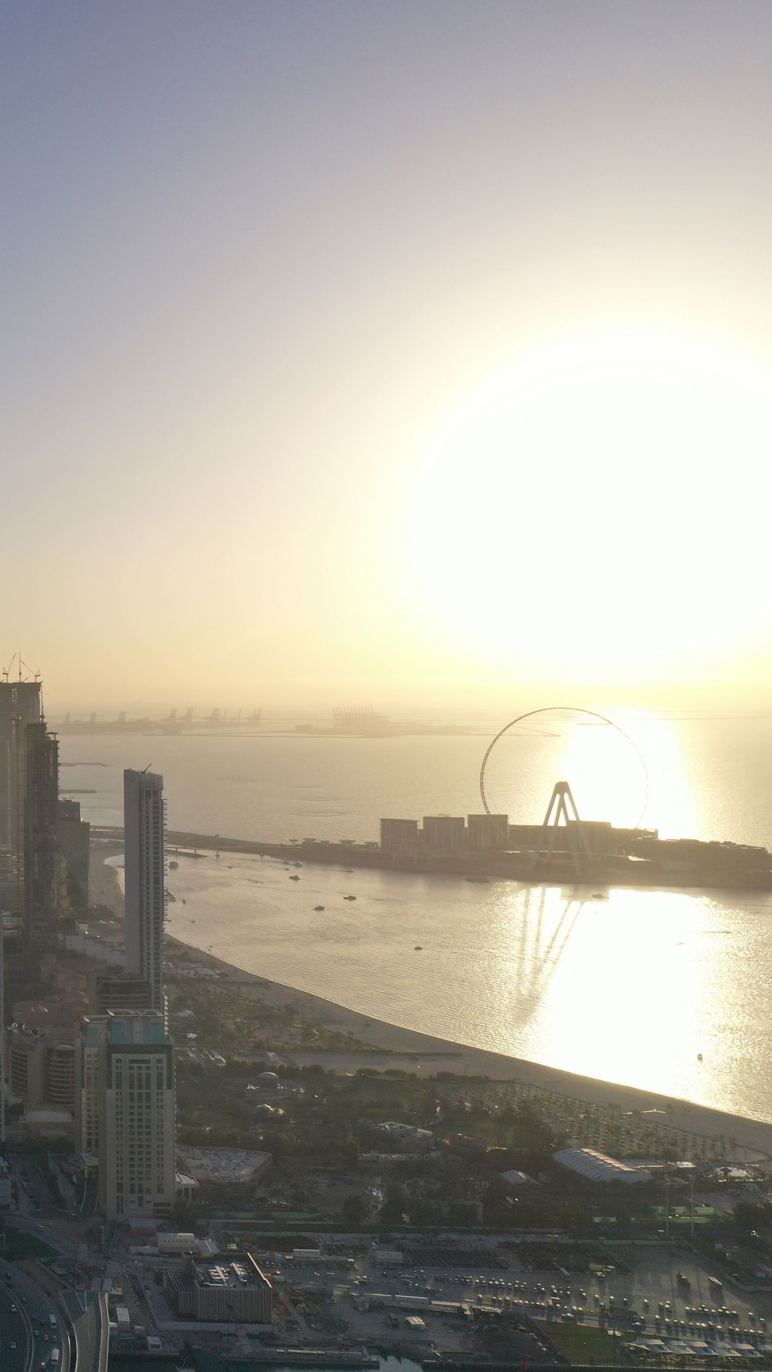 Downtown Dubai skyline at night, establishing aerial