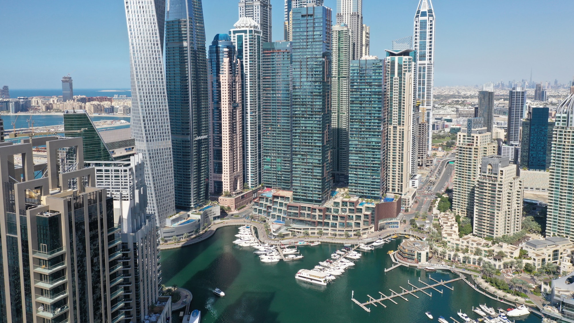 Aerial over luxury villas with sea view